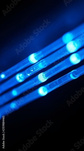 Glowing Blue Fiber Optic Cables for High Speed Internet Communication