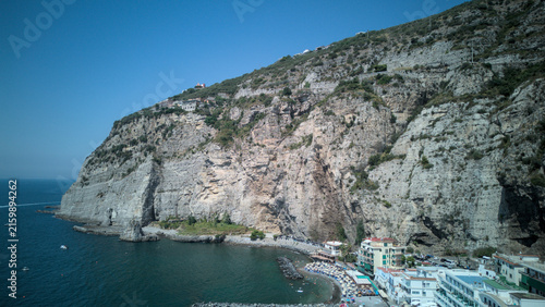 Drone view of a sheer rock cliff above the sea - Sorrento Coast
