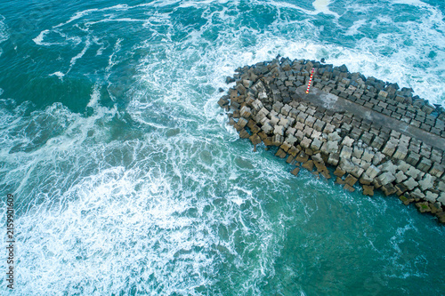Konstfotografi Concrete breakwater in rough ocean The Concept of protection