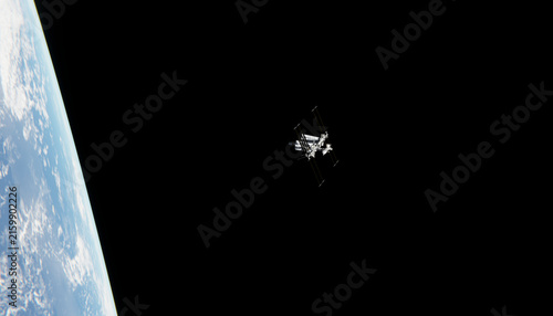 A manned orbital laboratory orbits earth in low earth orbit