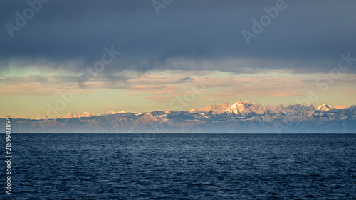Trieste in winter. Between the sea, snow-capped mountains, and historic monuments.