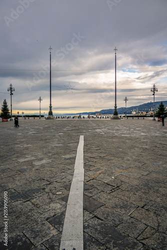Trieste in winter. Between the sea, snow-capped mountains, and historic monuments.