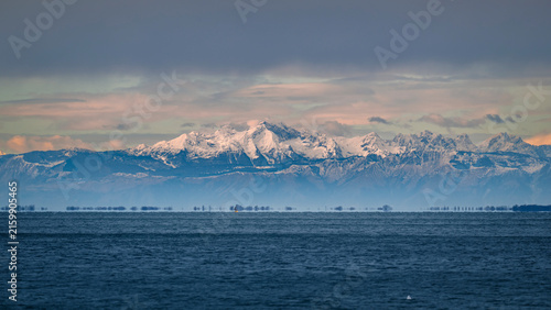 Trieste in winter. Between the sea, snow-capped mountains, and historic monuments.