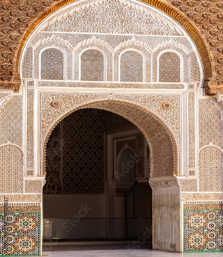 Photography Exquisite Medieval Archway with Intricate Stucco and Mosaic Tiles in Marrakech