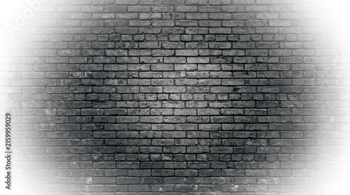 Vintage dark grey brick wall texture with bright white light leak effect overlay background with displays weathered grey texture overlaid construction monochrome wallpaper grayscale lighting with glow