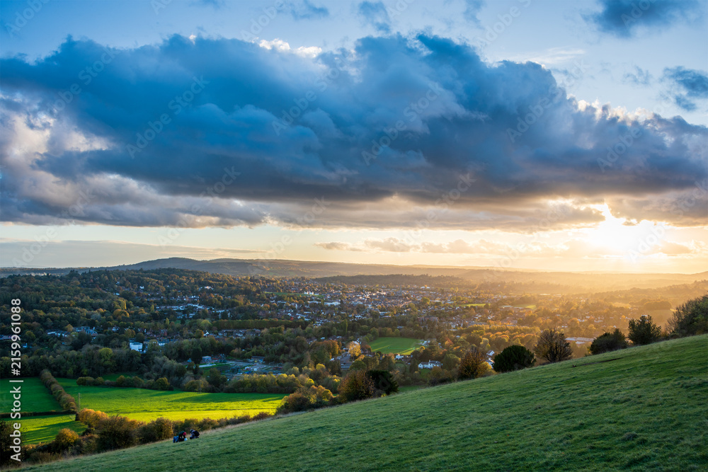 Fototapeta premium Beautiful Landscape image fo view from Box Hill in Surrey AONB during Autumn sunset
