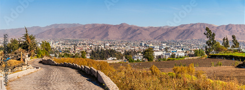 Bild auf Leinwand A view down a Cobblestone pathway and countryside on the outskirts of Arequipa w