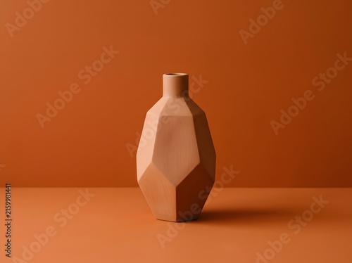 Terracotta Geometric Ceramic Vase in Minimalist Orange Studio Setting