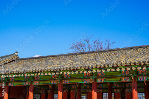 Traditional Korean Palace Roof and Wooden Corridor