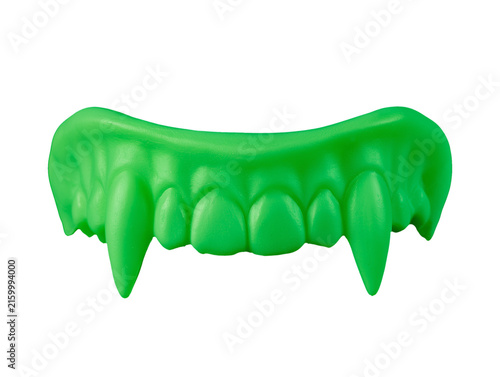 Glow in the Dark Green Plastic Vampire Fangs Toy Isolated