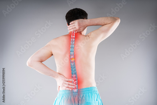 Lumbar and cervical spine hernia, man with back pain, compression injury of the intervertebral disc