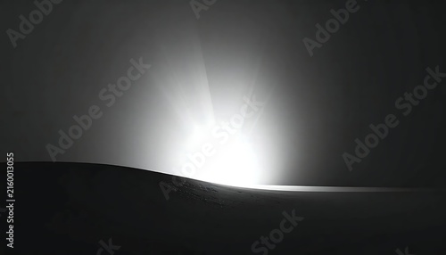 Sunrise over a dark landscape, symbolizing new beginnings and hope illuminating the horizon