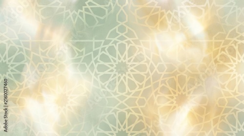 Gold Islamic geometric pattern with bokeh lights background.