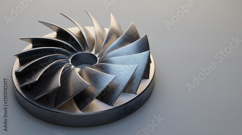 Metallic turbine impeller blade rotor component on gray surface with impeller