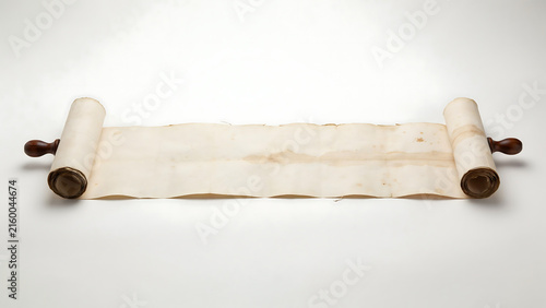 Old parchment scroll with wooden handles isolated on white background