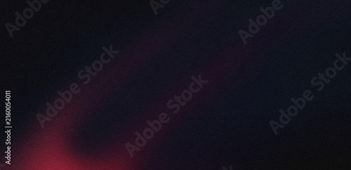 Abstract dark background with soft red light glow