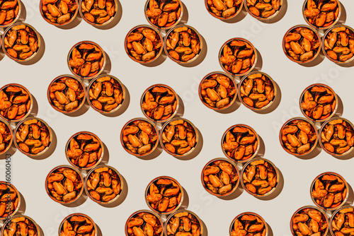 triangular pattern of mejillones en escabeche tins