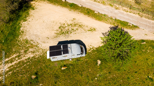 Fotografie Caravan solar panels on roof camping on nature. Aerial view