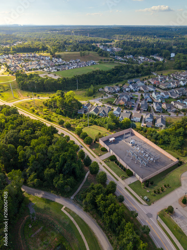 Aerial view of a substation surrounded by suburban community