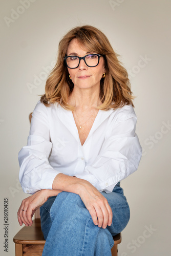 Portrait of confident businesswoman over white background