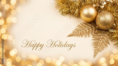 Elegant gold christmas greeting card design with shimmering tinsel against bokeh background copy space warm
