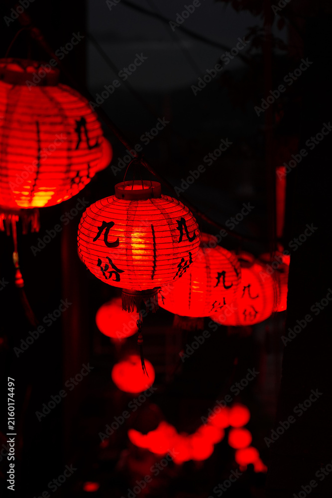 Fototapeta premium Jiufen old town with glowing red lanterns at night, Taiwan