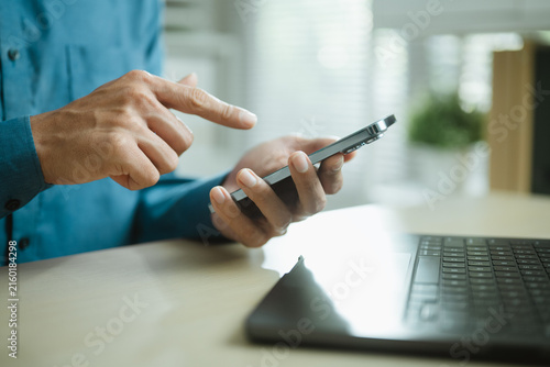 Quadro su tela using smartphone social with media internet; a person using a smartphone