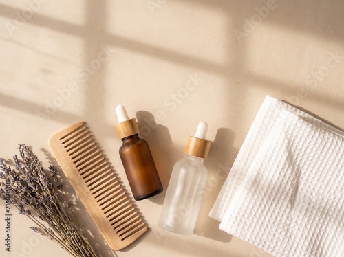 Serene Flat Lay Skincare products Frosted Dropper bottles Lavender