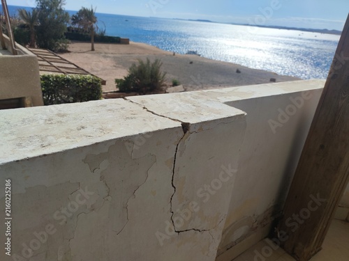 earthquake damage. cracked wall after earthquake. the aftermath of a small earthquake