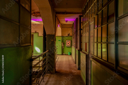 Abandoned old industrial textile research institute with laboratory chemistry glass, machinery workshop and factory hall