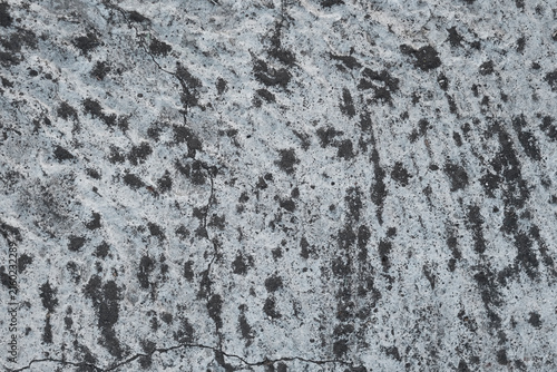 Grunge concrete texture with swirl marks, rough cement background