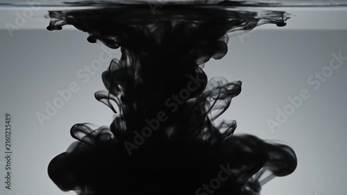 Dark swirling smoke against a bright gradient background, abstract motion study, smoky ethereal atmosphere, perfect for dramatic visual effects or transitions, mysterious and powerful mood