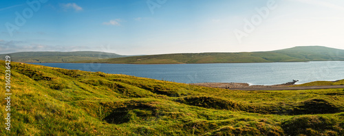Panorama of Cow Green Reservoir, in the North Pennines a landscape of sweeping  moorlands, renowned for vast open skies, winding rivers and historic stone buildings in a National Landscape