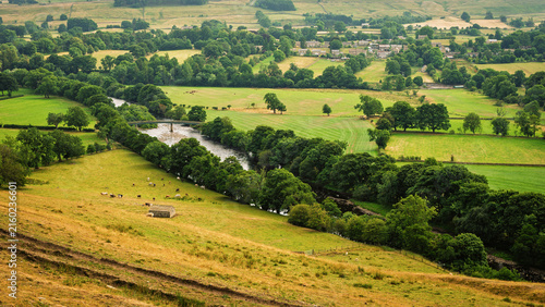 River Tees flows through farmland in Upper Teesdale, on the North Pennines, a landscape of sweeping  moorlands, renowned for vast open skies and winding rivers  in a National Landscape