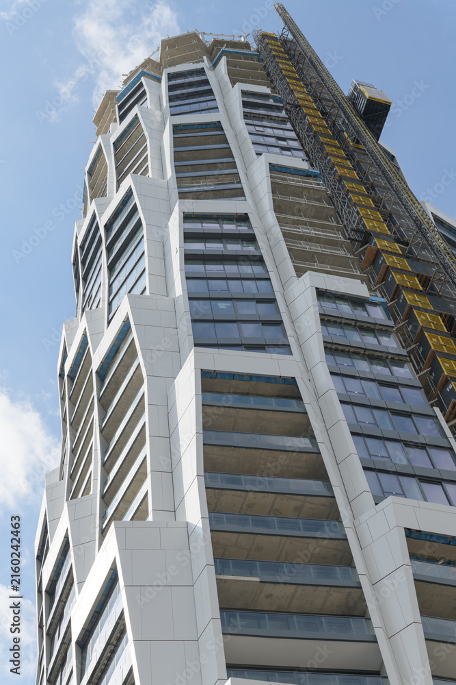 Fototapeta premium north elevation of One Delisle designed by Jeanne Gang of Studio Gang, near Yonge St and St Clair Av W, Toronto