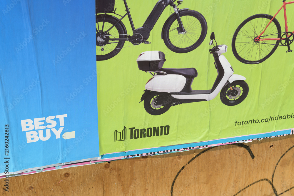 Fototapeta premium wheatpaste posters in Toronto (Best Buy and City of Toronto bicycle use)