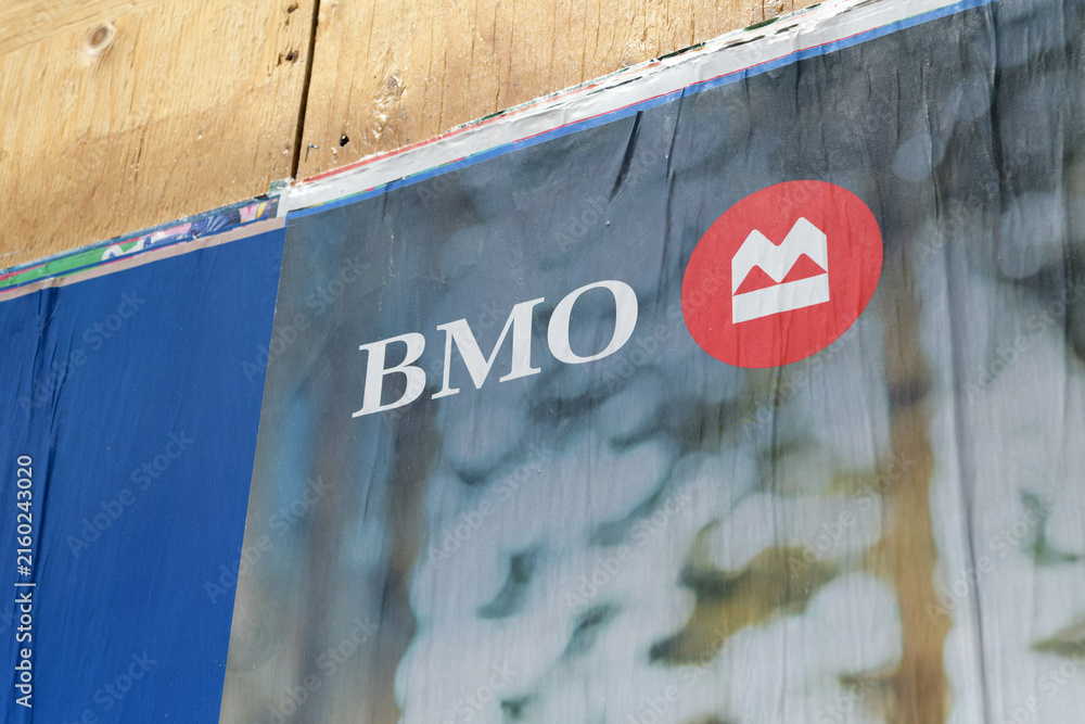 Fototapeta premium wheatpaste poster with BMO Financial Group corporate logo in Toronto