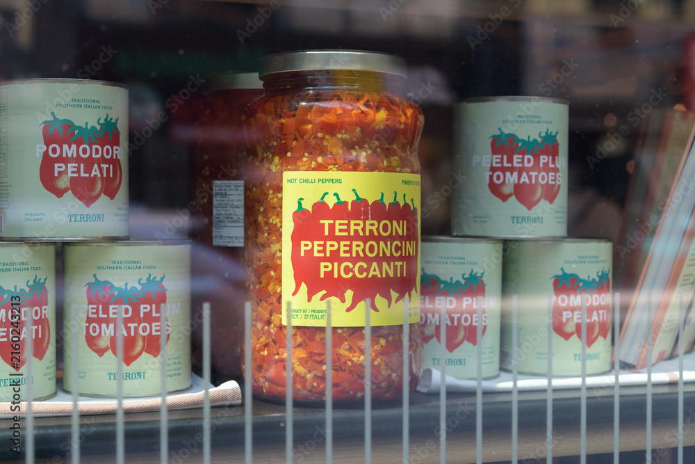 Fototapeta premium window display with Terroni’s signature hot peppers at Sud Forno, a restaurant, located at 132 Yonge St, Toronto