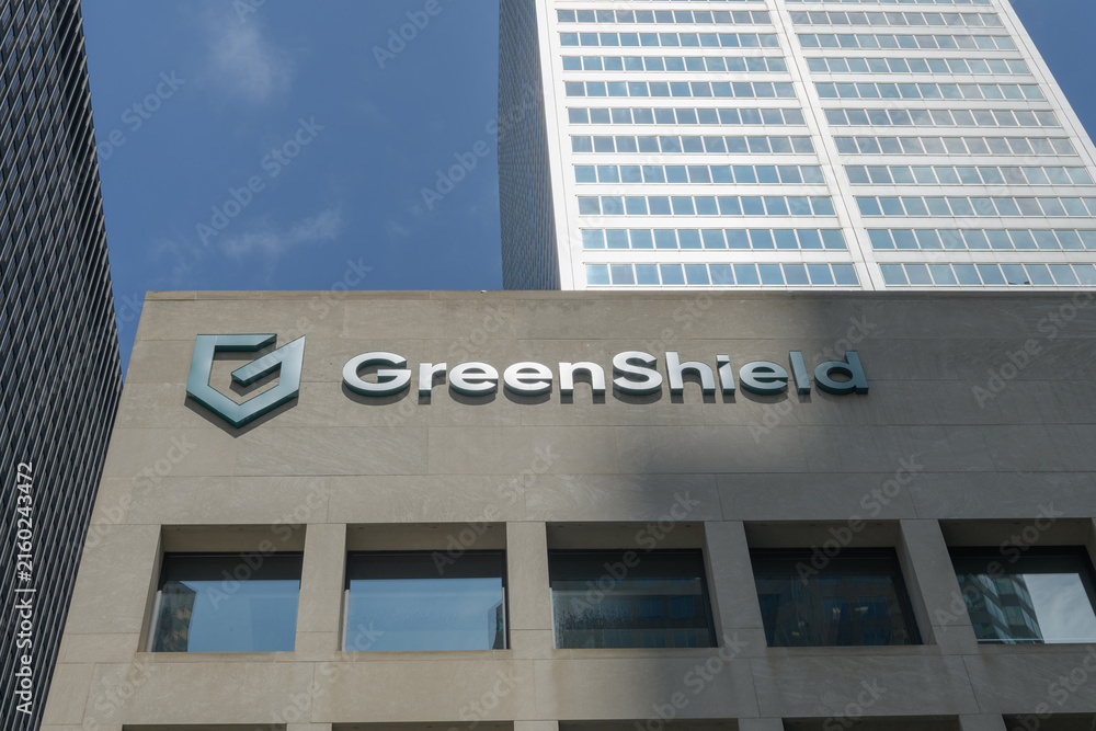 Fototapeta premium GreenShield sign on the exterior of Commerce Court South at 30 Wellington St W, Toronto