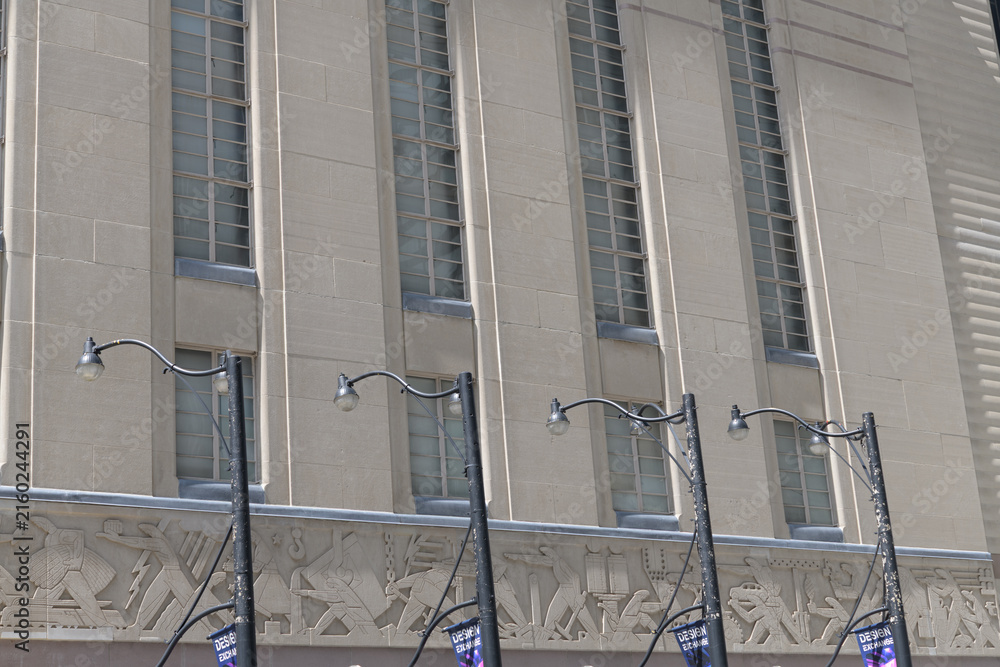 Fototapeta premium facade of the Toronto Stock Exchange Building at 234 Bay St, designed by George & Moorhouse with SH Maw in Art Deco style, 1937 (carved stone frieze by Charles Comfort)