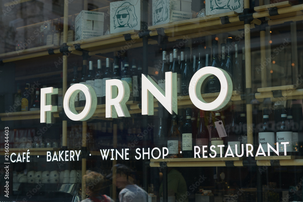 Naklejka premium display window and sign at Sud Forno, a restaurant, located at 132 Yonge St, Toronto