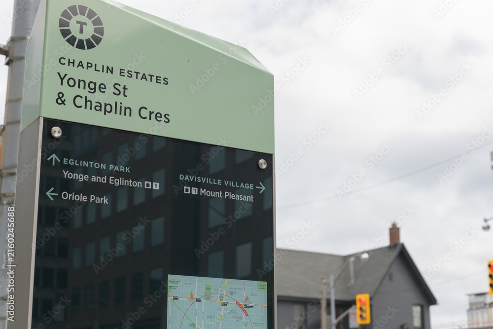 Fototapeta premium green glass-and-steel structure at Chaplin Estates (Yonge St & Chaplin Cres), Toronto