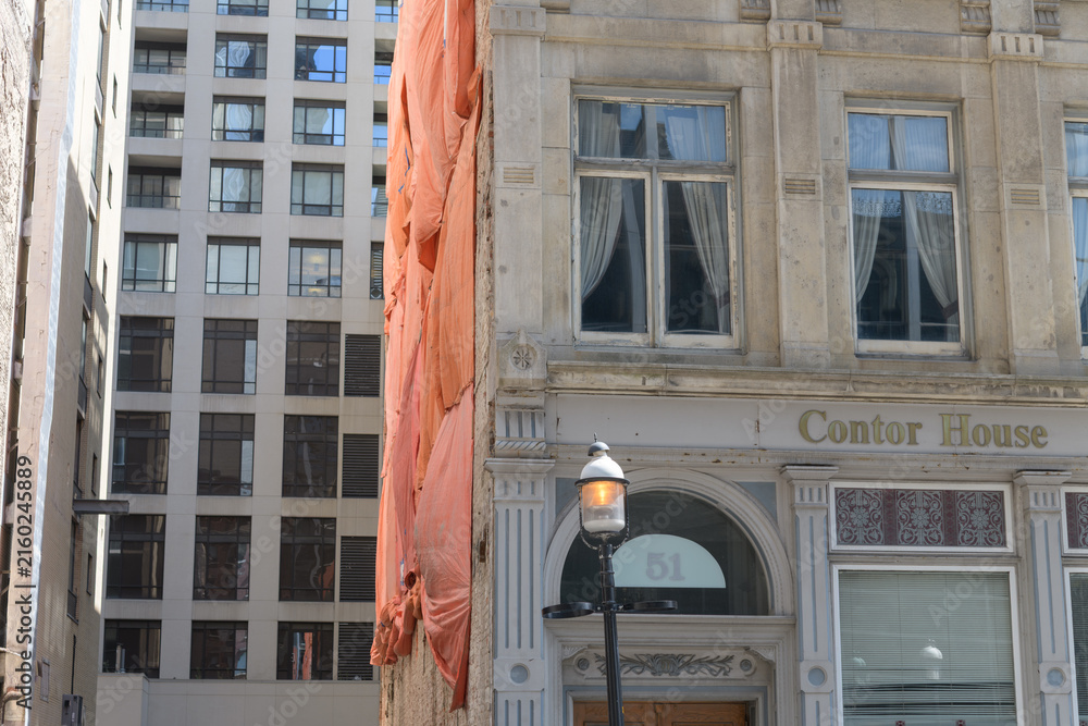 Fototapeta premium cavity of demolished building beside historic Commercial Travellers’ Association Building (Cantor House), located at 51 Yonge St, Toronto