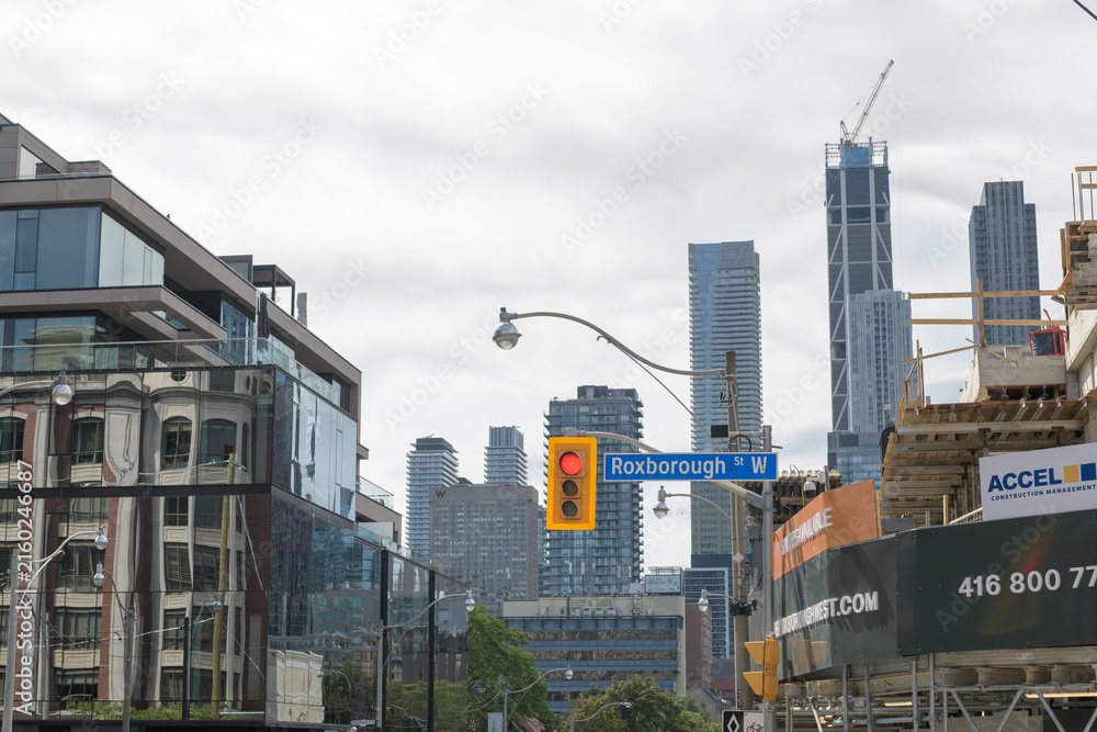 Fototapeta premium looking south on Yonge St from One Roxborough West (at right) on an overcast morning in Toronto
