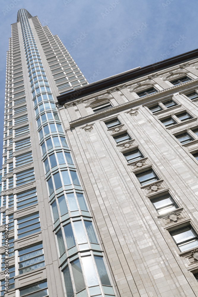 Naklejka premium heritage building and slender tower at One King West Hotel & Residence (former Dominion Bank building), Toronto