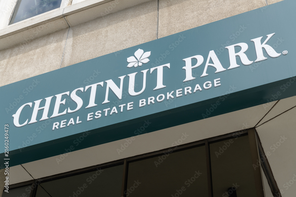 Naklejka premium exterior building and sign of Chestnut Park Real Estate Ltd, Brokerage located at 1300 Yonge St, Toronto