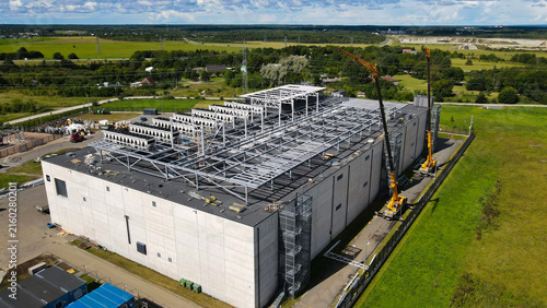 Принти на полотні Large data center building under construction with cranes and heavy equipment, s