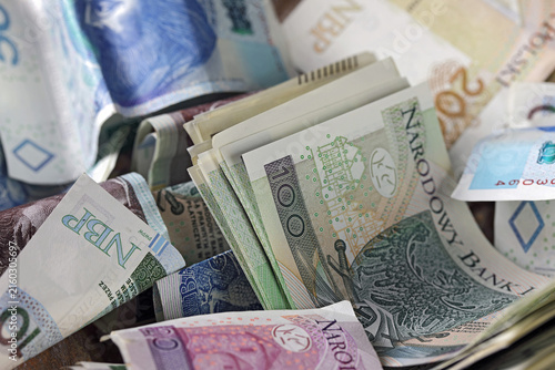 These banknotes, which are from Poland, are bent and placed in a disorderly manner, and they come in various denominations