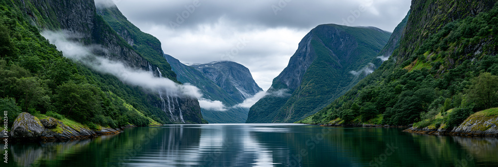Naklejka premium magnificent norwegian fjord panorama, dramatic norwegian fjord with cascading waterfalls and mist, breathtaking mountain fjord landscape in norway