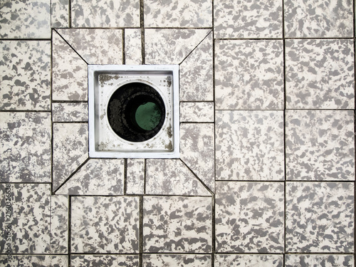 Obraz w ramie Floor tiles with open drain